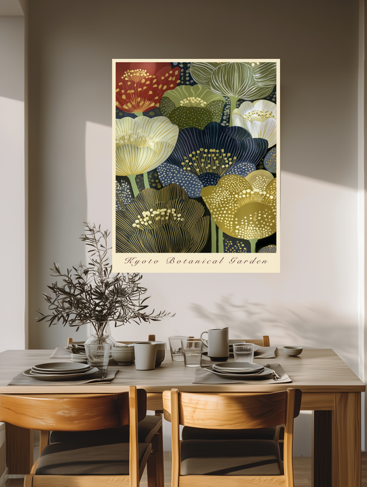 Japanese botanical garden exhibition print above a wooden dining table with olive branches and stoneware