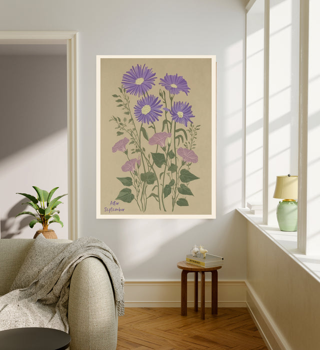 September birth flower art print of purple asters and pink morning glory in a gold frame, Aster September lettering, leaning against a panelled wall
