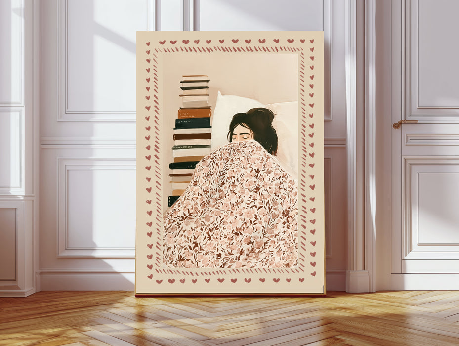 Book lover art print of a girl sleeping under a floral duvet beside a stack of books, with a rosy heart border, leaning against a panelled wall