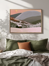 Pink sky mountain cabin wall art with snowy pines and chimney smoke
