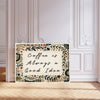 Coffee Is Always a Good Idea art print with folk floral border, leaning against a white panelled wall