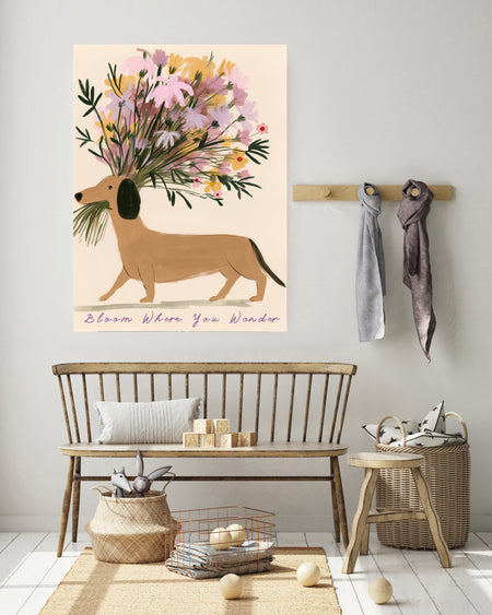 Sausage dog carrying a pastel wildflower bouquet, quote art print shown in a styled room