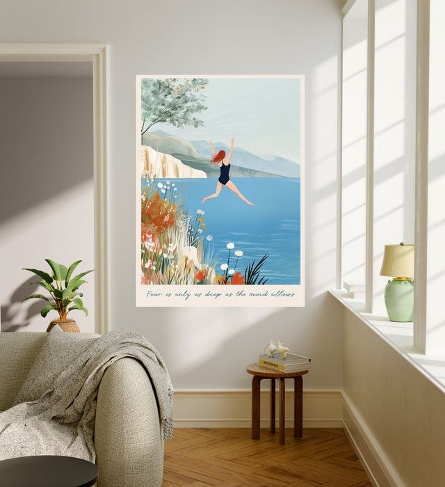 Wild swimming quote art print hanging in a bright living room above a linen sofa with a plant and side table