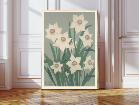 Narcissus December birth flower print hanging in a sunlit living room above a linen armchair with side table and plant