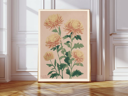 Chrysanthemum November birth flower print hanging in a sunlit living room above a linen armchair with side table and plant