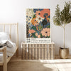 Peach and blue Japanese floral quote art print resting on a wicker chest beside a bed and olive tree in a neutral bedroom