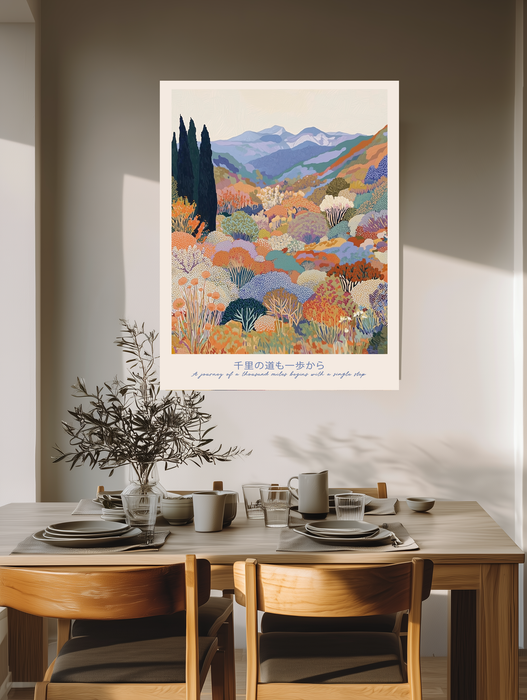 Japanese mountain garden quote art print above a wooden dining table with olive branches and stoneware