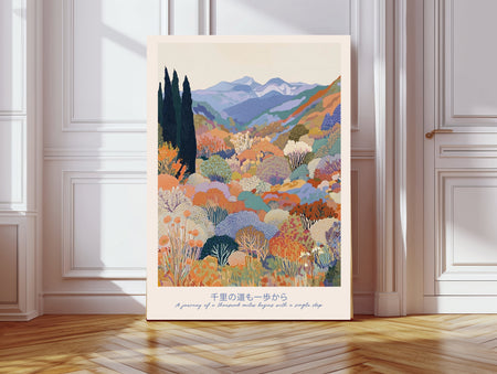 Japanese mountain garden art print with the quote A journey of a thousand miles begins with a single step, colourful blossoming valley and blue peaks, leaning against a panelled wall