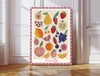 Fruity fine art print featuring watercolour peaches, pears, strawberries, blueberries and citrus fruit with a pink gingham border, leaning against a white panelled wall