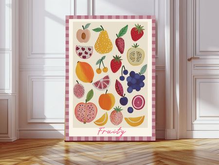 Fruity fine art print featuring watercolour peaches, pears, strawberries, blueberries and citrus fruit with a pink gingham border, leaning against a white panelled wall