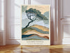 La ou le Vent Murmure windswept tree landscape print leaning against a white panelled wall