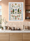 Close up of hand-lettered Home Sweet Home with blush tulips and daisies, giclee print