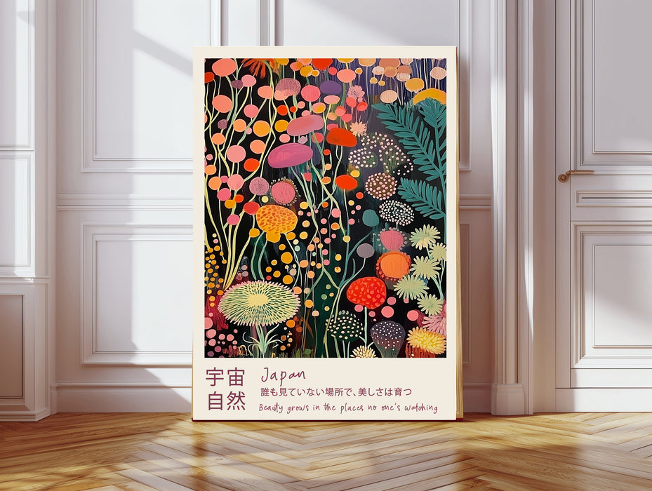 Midnight wildflower meadow art print in a gold frame with the Japanese proverb Beauty grows in the places no one's watching, coral and marigold blooms on black