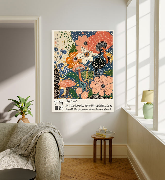 Maximalist Japanese flower art print hanging in a sunlit living room above a linen sofa with side table and plant