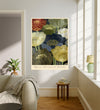 Vintage Kyoto botanical poster hanging in a sunlit living room above a linen sofa with side table and plant