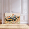 Autumn mountain valley art print with snow-capped peak, golden forest and wildflower meadow in peach, terracotta and slate blue, landscape format, leaning against a white panelled wall