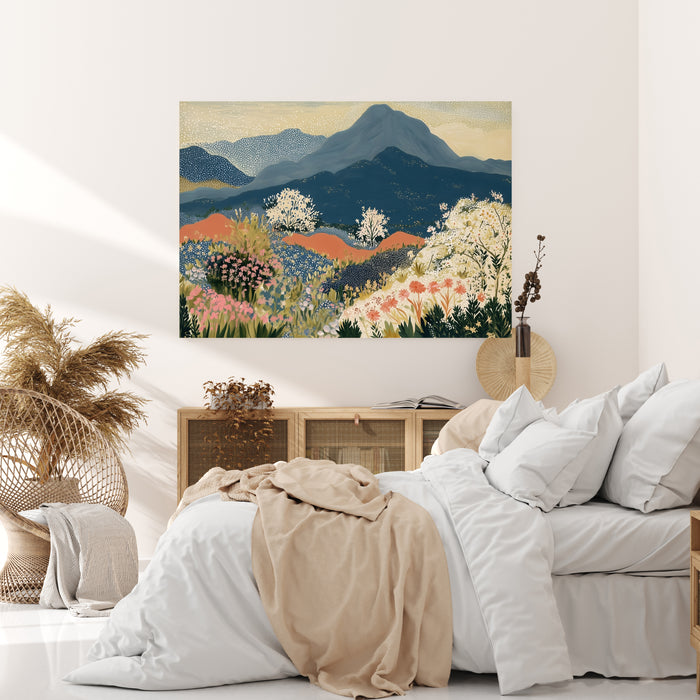 Navy and terracotta mountain wildflower canvas above a cane sideboard in a sunlit neutral bedroom with pampas grass