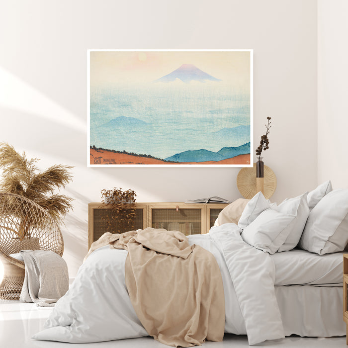 Mount Fuji rising above misty blue clouds, vintage Japanese landscape print in a calm room
