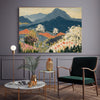 Mountain wildflower meadow wall art on a grey panelled living room wall with green velvet chair and brass accents