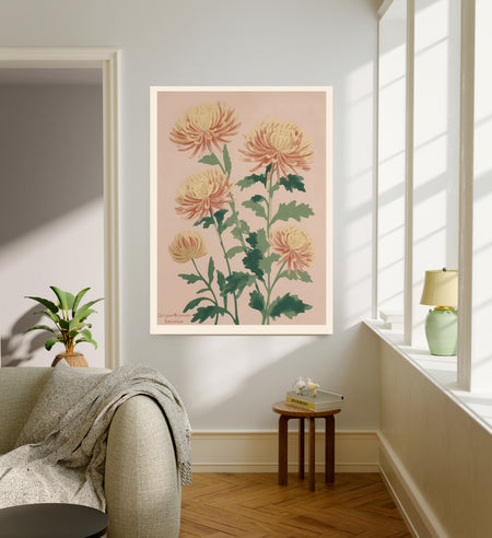 November birth flower art print of yellow and coral chrysanthemums in a gold frame, Chrysanthemum November lettering, leaning against a panelled wall