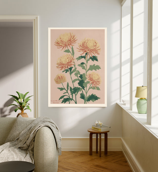 November birth flower art print of yellow and coral chrysanthemums in a gold frame, Chrysanthemum November lettering, leaning against a panelled wall