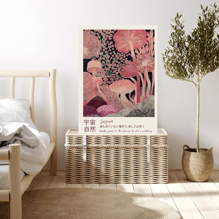 Pink fungi Japanese quote art print resting on a wicker chest beside a bed and olive tree in a neutral bedroom
