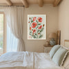 Red poppy birth month flower art print on a beamed bedroom wall with linen curtains and sage green bedding