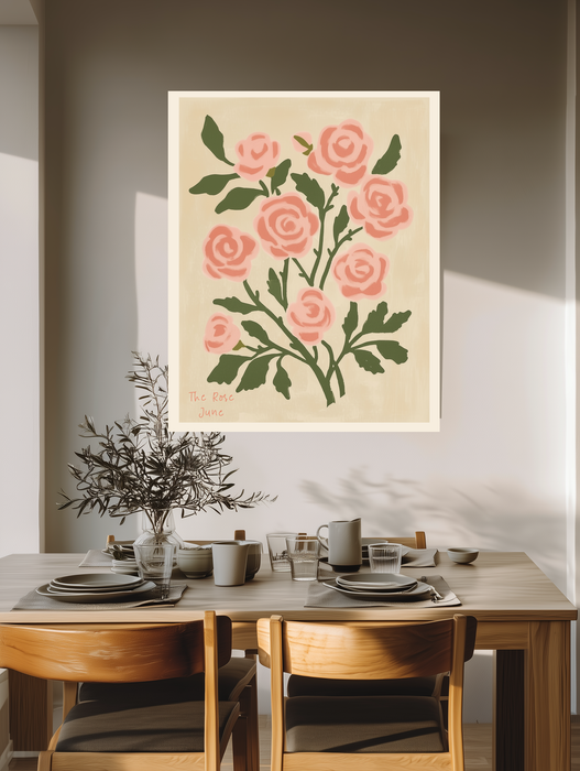 Rose botanical birth flower print above a wooden dining table with olive branches and stoneware
