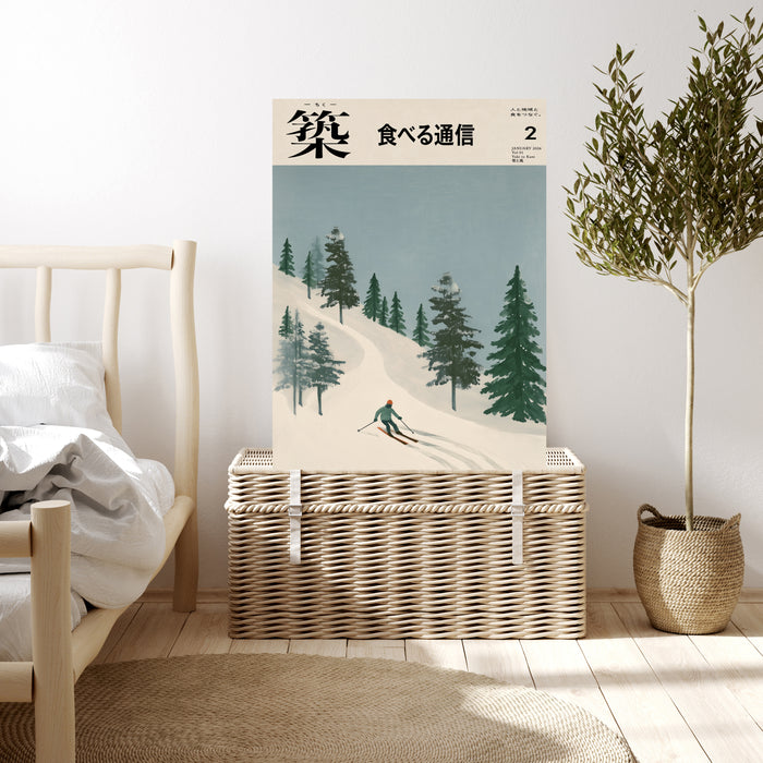 Japanese skiing landscape print resting on a rattan trunk in a neutral bedroom with olive tree