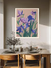 Violet botanical birth flower print above a wooden dining table with olive branches and stoneware